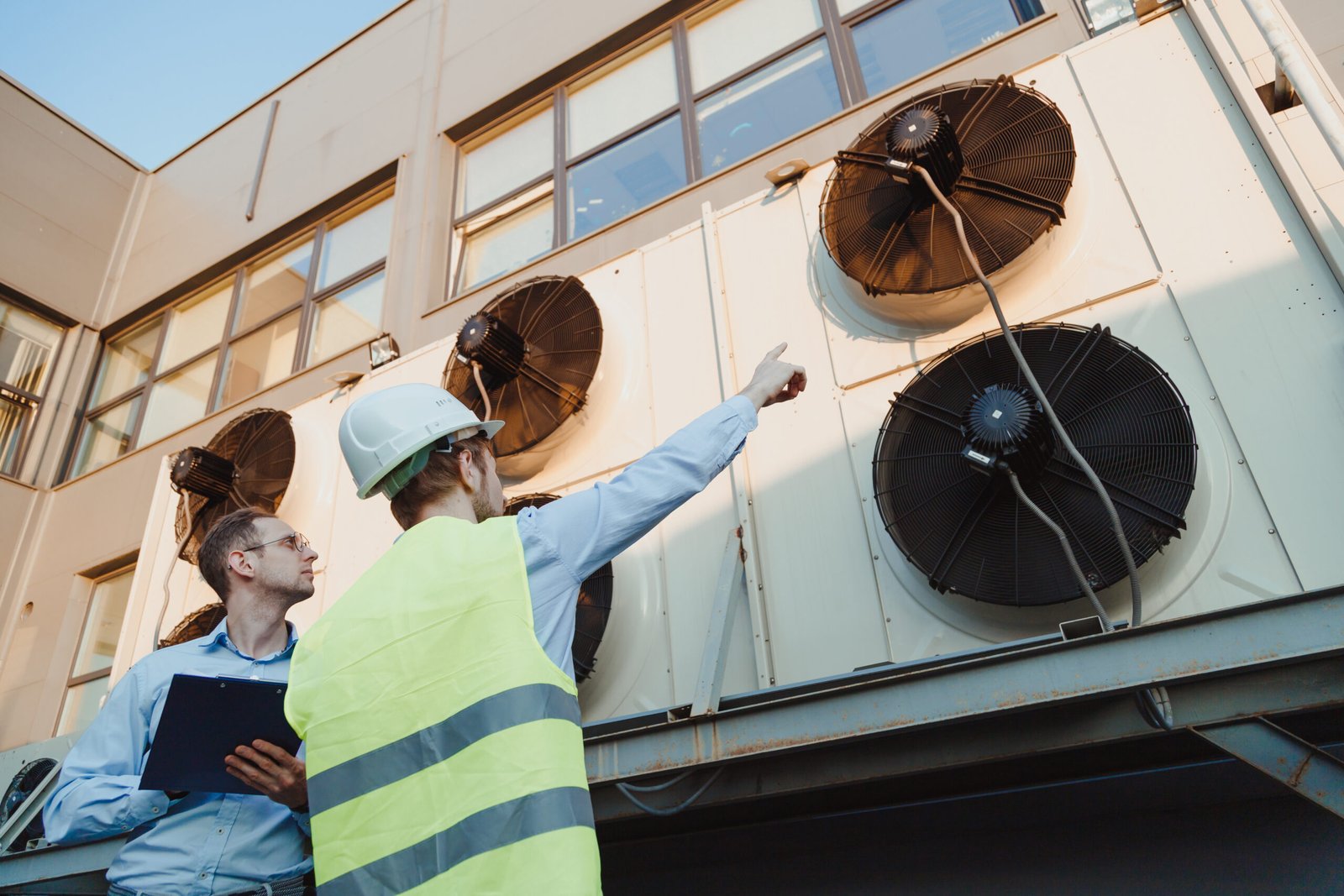 service-engineers-in-uniform-inspecting-industrial-2023-11-27-05-36-19-utc-scaled.jpg